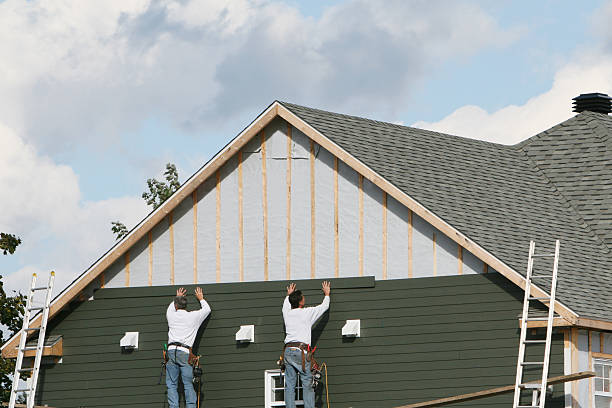 Professional Siding technician working in Thomasville, PA